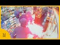 Moment convenience store is doused in petrol and set alight