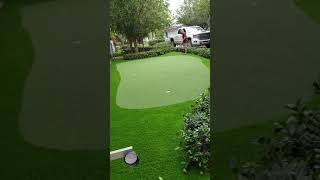 Artificial grass putting green installation in south Florida.