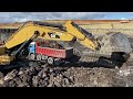 caterpillar 390d excavator loading overburden on mercedes and man 4 axle trucks interkat sa