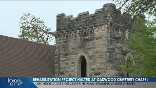 The discovery of human remains is halting a renovation project at Austin's oldest cemetery.