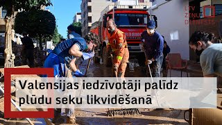 Valensijā meklē pazudušos;  iedzīvotāji palīdz plūdu seku likvidēšanā