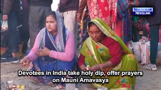 Devotees in India take holy dip, offer prayers on Mauni Amavasya