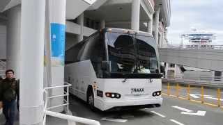 Traxx Coach Lines Prevost H3-45 #818 Leaves Canada Place 2