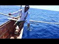 filipino fishing styles in the phillipines handline fishing catching trigger fish during north sumer