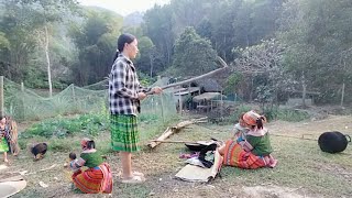 single mother and child, forced out of the shack by the shack owner