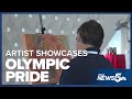 Local artist showcases his Olympic pride at painting event at USOPM