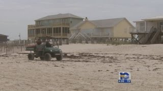 Two men drown on Ala. coast; searching for third person