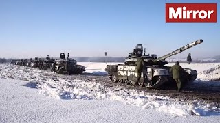 Russian videos show troops withdrawing from Ukraine border