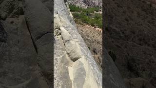 Walking up a precarious sand stone ledges hogs back in the Escalante Grand Staircase