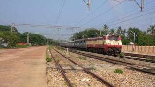 22053 AJJ WAP-1 cruising through Kannur South with 16606 Ernad Express