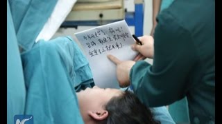 Doctors write notes to help deaf-mute mother give birth