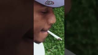 emtee rolling a blunt