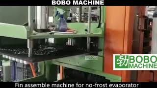 Aluminum evaporators fin and tube assembling machine with automatic fin alignment