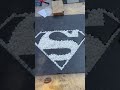 incredible custom superman paver cut in by master mason