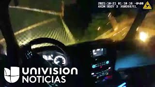 En video: Un policía estrella su patrulla contra una puerta hasta derribarla, para realizar un resca