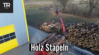 Holz Stapeln mit John Deere 6420