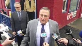 Gov. Paul LePage addresses the media after lunch at Simones'