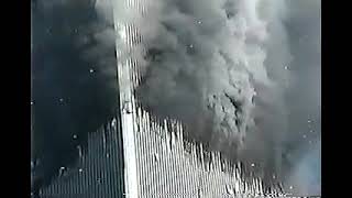 WTC 2 Smoldering With People Fleeing