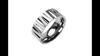 Jewellery - Titanium ring with bullet-shaped cuts