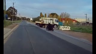 Aussiecams - Overtaking Motorcyclist goes within a whisker of this turning truck High Wycombe WA