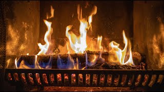 Roaring cozy fire with Golden Yellow and Blue flames in a dark intimate fireplace - Smooth 60fps