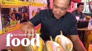 Times foreign correspondent David Pierson tries a variety of durians