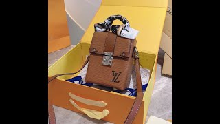 LV SS21 camera case with water corrugated box