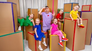 Cinq enfants cache cache dans les grandes cases