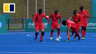 China's paralympic footballers overcome blindness