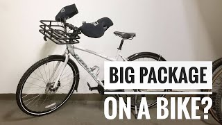 Dropping off a package using the Burley Travoy Urban bicycle trailer