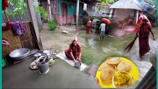 বর্ষাকালে গ্রামের বউরা ঠিক এই ভাবেই ভিজে ভিজে সংসারের সমস্ত কাজ করে,