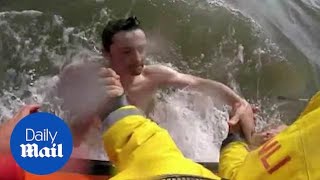 Amazing moment RNLI rescue two boys swept out to sea in Lyme Regis