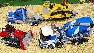 Construction Vehicles build a Lego Police station