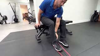 Seated hamstring curls with rubber band