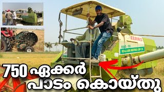 Rice Harvesting In kerala. harvesting machine rice field