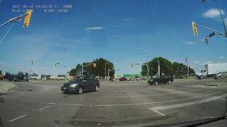 Left turn driver over line and cutting off - Brantford, Ontario