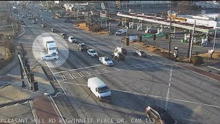 Traffic, dashcam video after truck pushes car through intersection in Gwinnett County