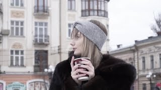 Young Smiling Girl Drinking Hot Coffee on the Street at Winter (Stock Footage)