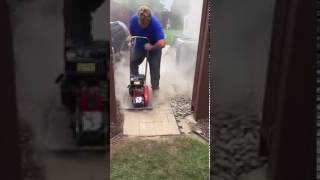 Tamping a paver walkway~ holland pavers