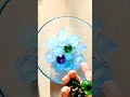 Marbles Rotating, Sliding and Spinning on the Surface on Ice Cubes Reverse