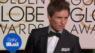 Eddie Redmayne looks smart in printed suit at Golden Globes - Daily Mail