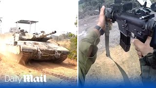 Israeli troops advance on foot and open fire as they charge into Gaza Strip with tanks