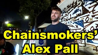 Alex Pall of the band Chainsmokers chats away wiht paps while waiting for ride i
