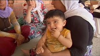 Thousands of Yazidi refugees reach sanctuary in Iraqi Kurdistan