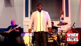 Pastor Eugene Johnson singing, \