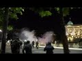 Protesters light flares, try to storm parliament