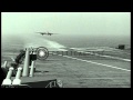 Royal Navy British Jet fighter makes a pass over the United States aircraft carri...HD Stock Footage Royal Navy British Jet fighter makes a pass over the United States aircraft carri...HD Stock Footage