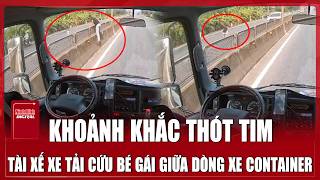 Thót tim khoảnh khắc tài xế bỏ xe, lao qua dải phân cách cứu bé gái đứng giữa quốc lộ