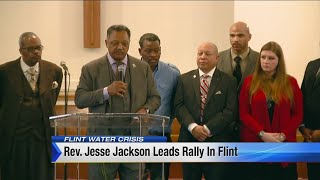 Rev. Jesse Jackson leads rally in Flint