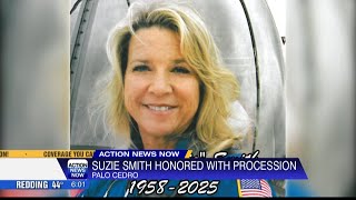 Thousands line highway overpasses and streets to welcome home body of nurse killed in REACH medical